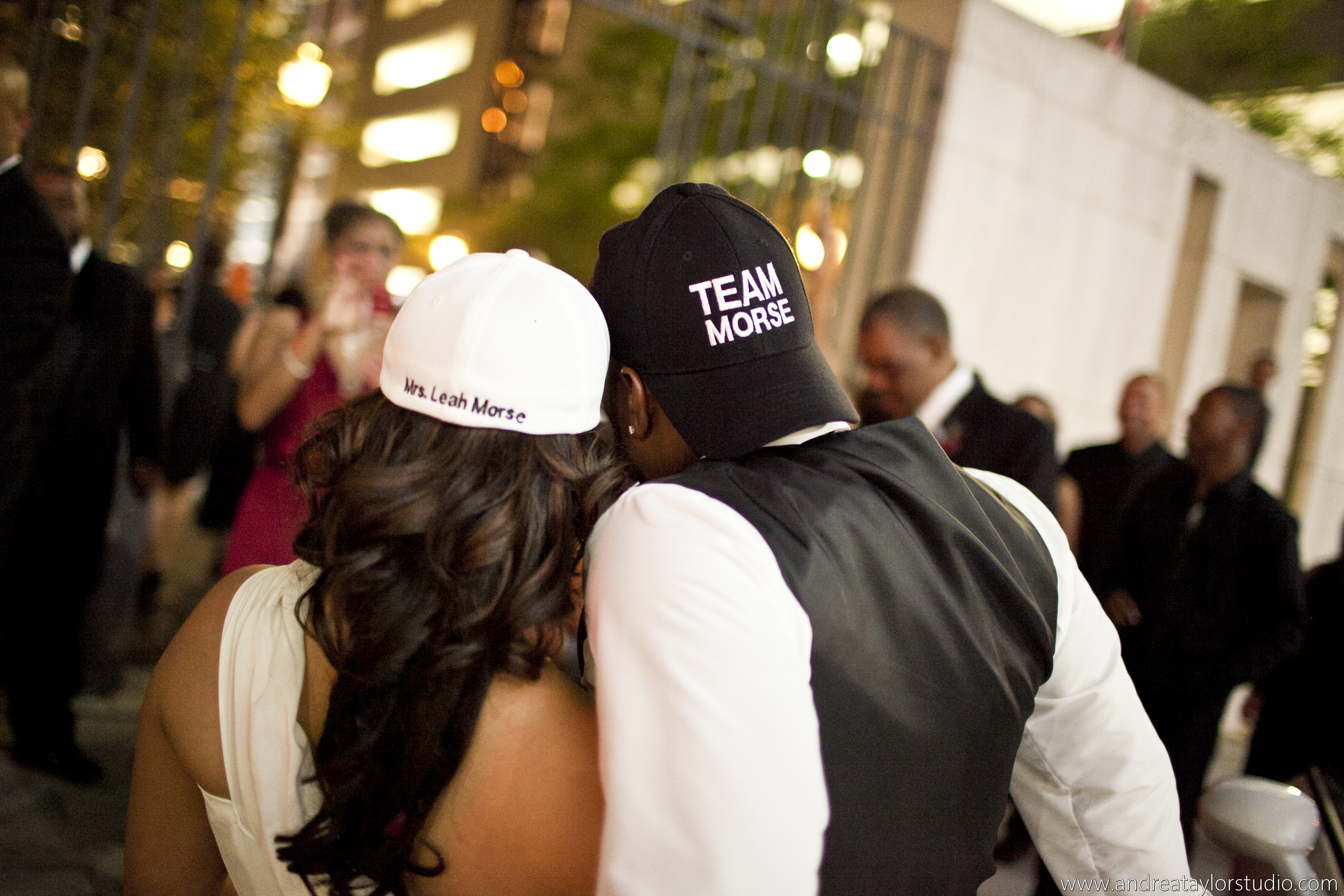 Guests embrace and pose for a picture while enjoying their luxury event with loved ones
