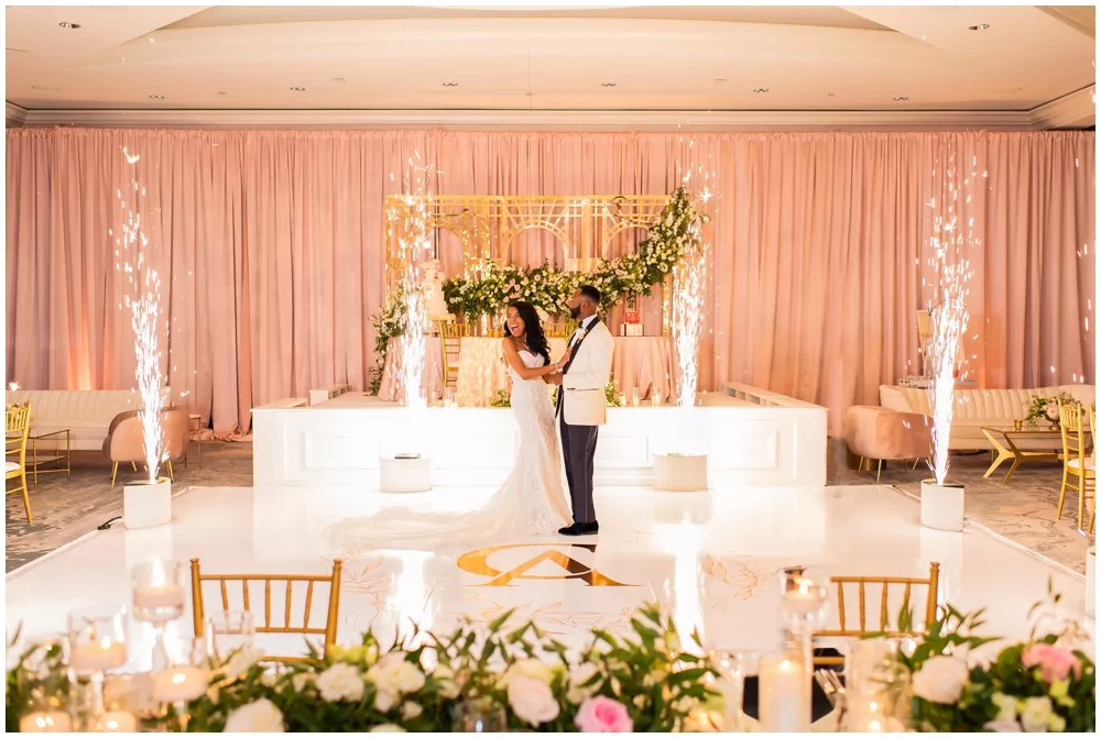 Newlywed couple dancing at their Four Seasons Atlanta wedding reception.